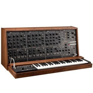 vintage Korg PS-3300 polyphonic analog synthesizer, featuring three large panel sections filled with knobs, sliders, and patch cables, with a full 48-key keyboard beneath