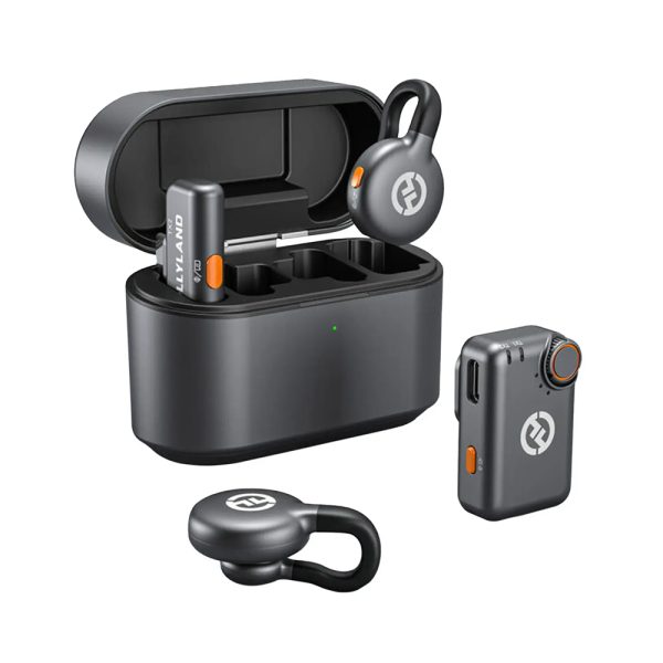 Complete Hollyland LARK M2S Combo wireless mic kit including dual mics, receiver, cables, and charging case arranged on desk